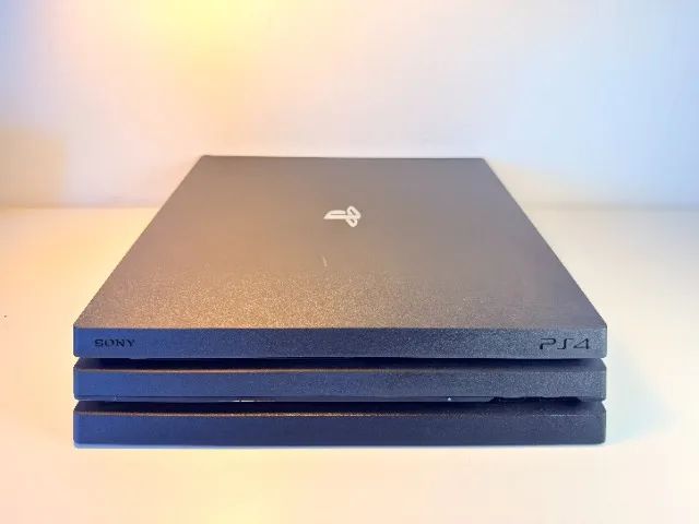 PS4 Pro 1TB - 1 Fone + Controle + 1 Jogo UR0129 - Foto 6