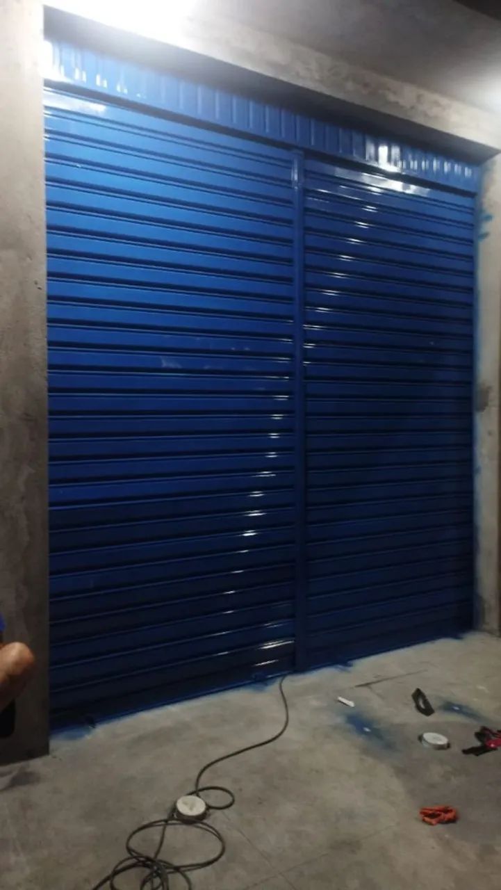 Pintura de portão de lojas 
