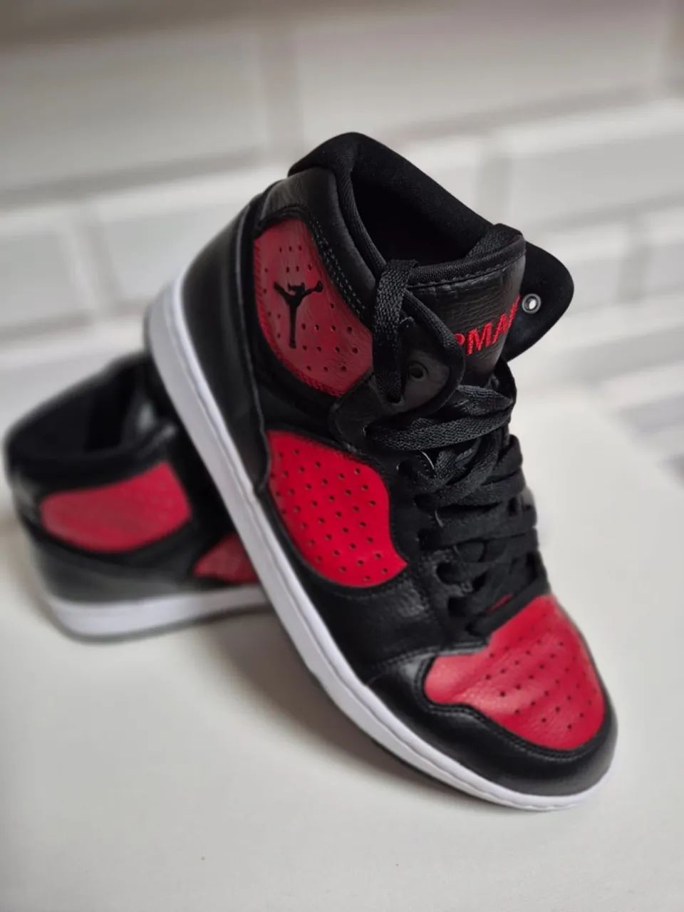 Tênis Jordan (cano alto)