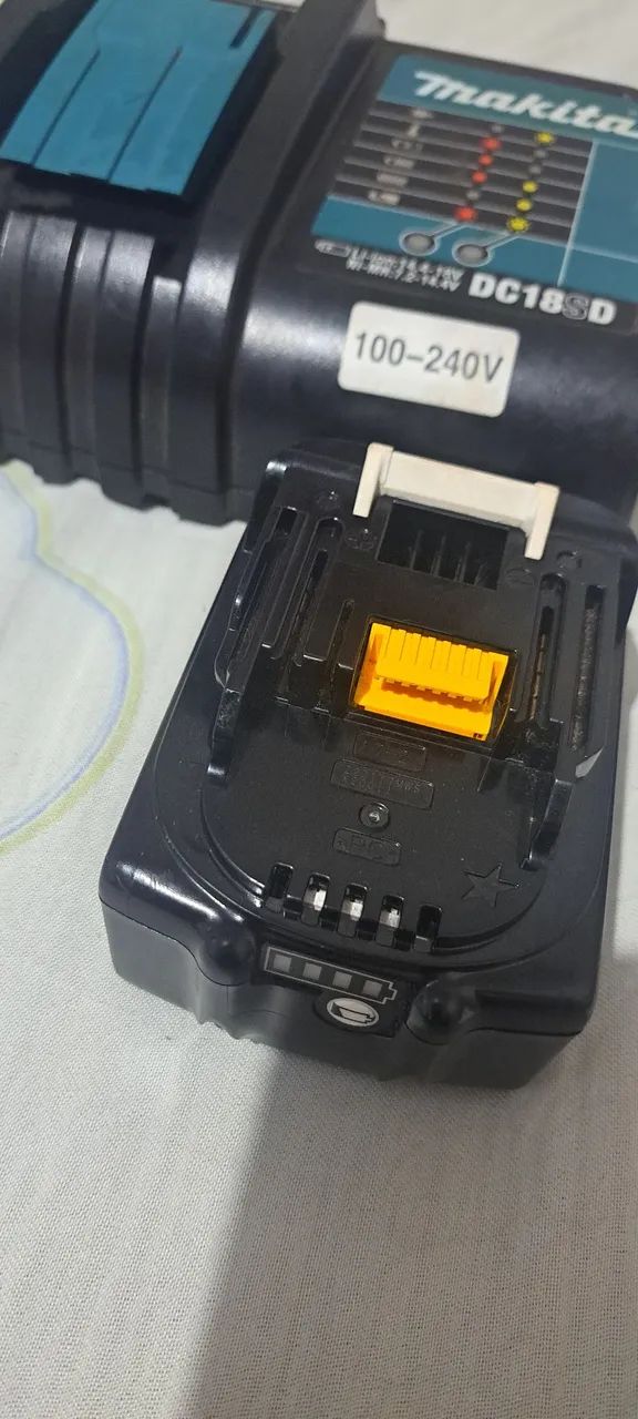 Carregador e bateria 6 ah nova