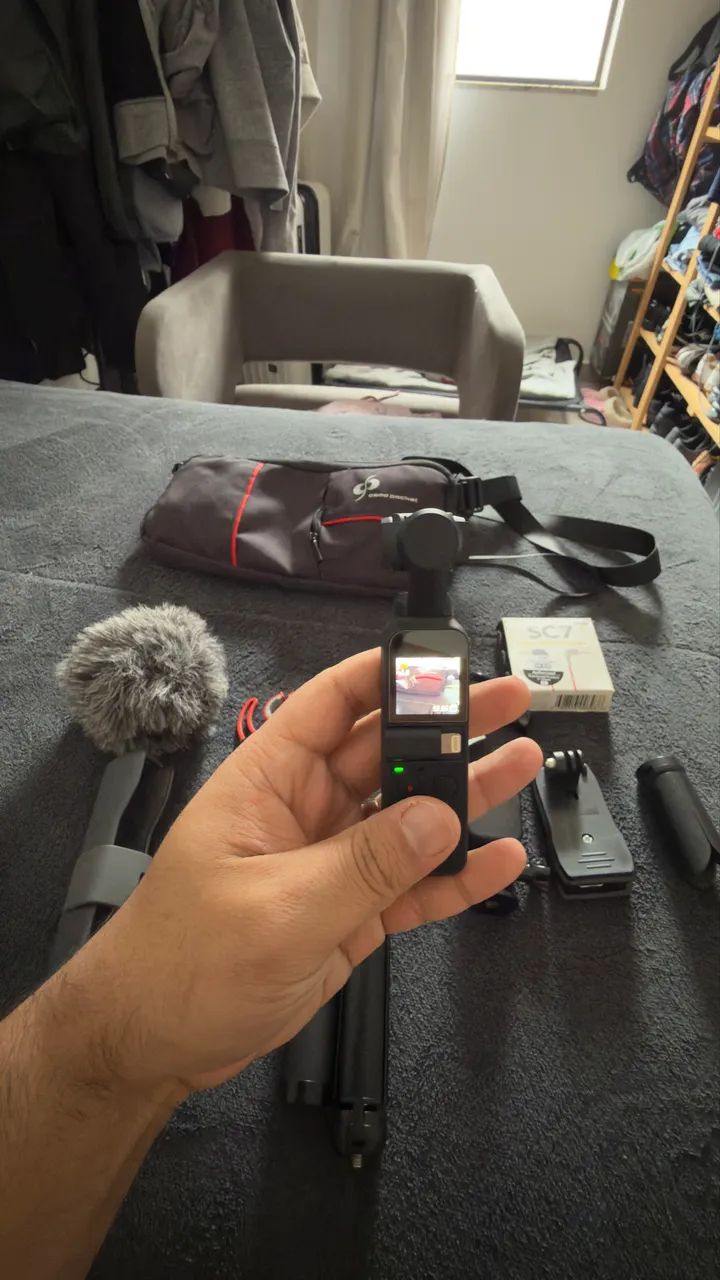 Câmera DJI osmo pocket ll + kit microfone Rode  e tripé  - Foto 3