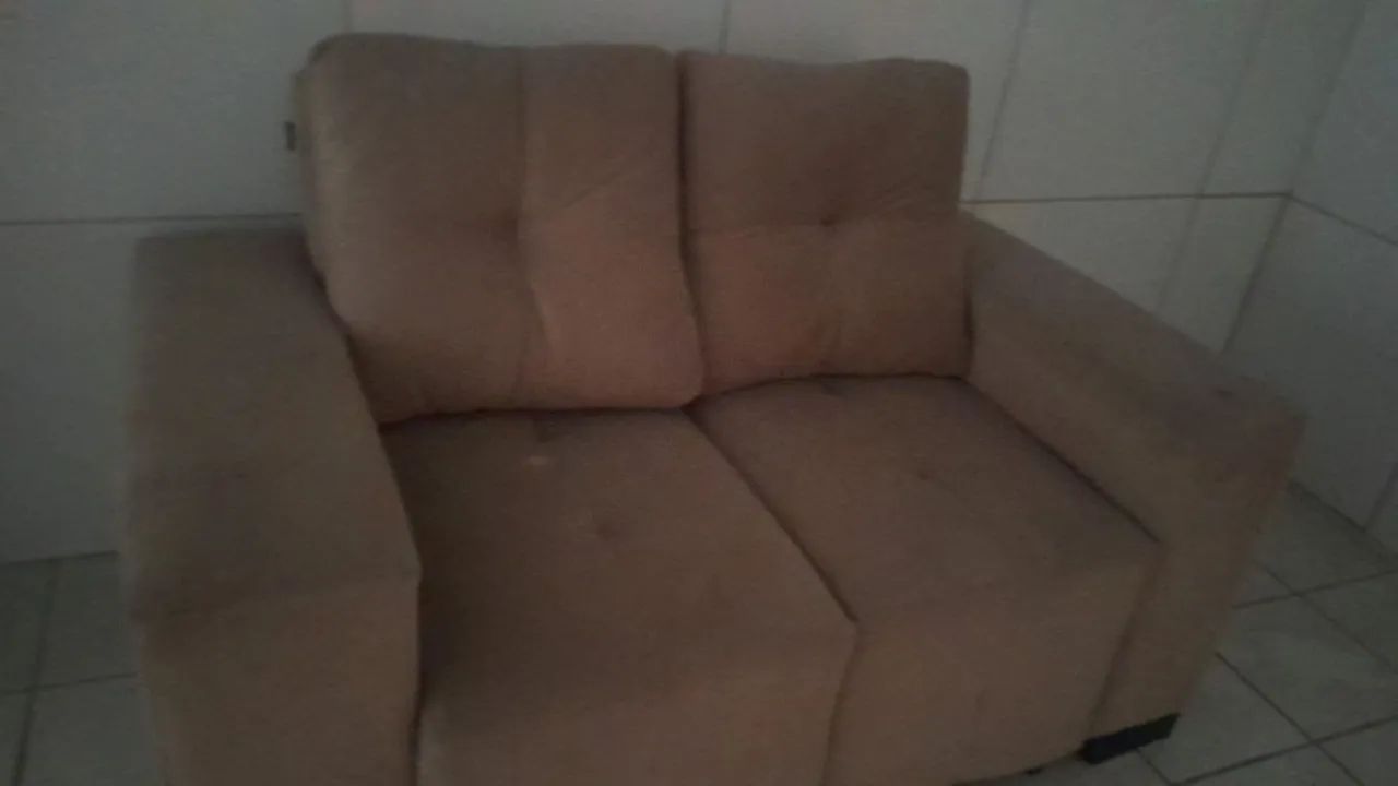 Sofá  retrátil, todo bom. $380