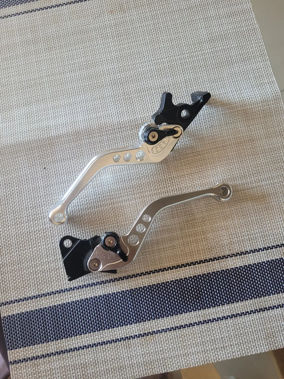 Manetes de freio e embreagem para moto
