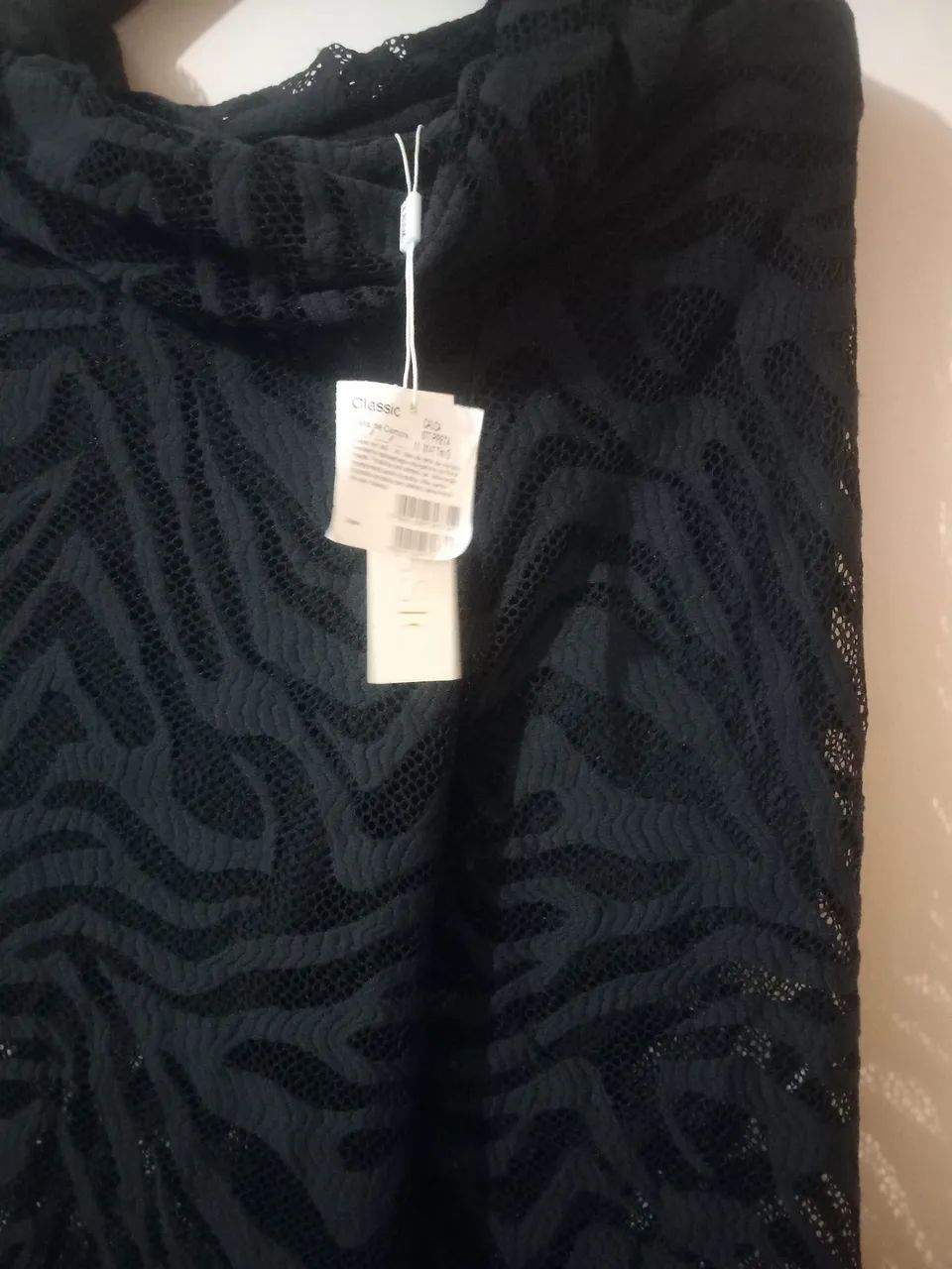 Vendo esse macacão de renda novo. - Foto 2