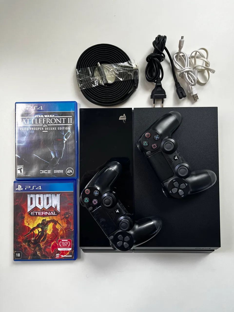 PlayStation 4  com dois controles e jogos  - Foto 2