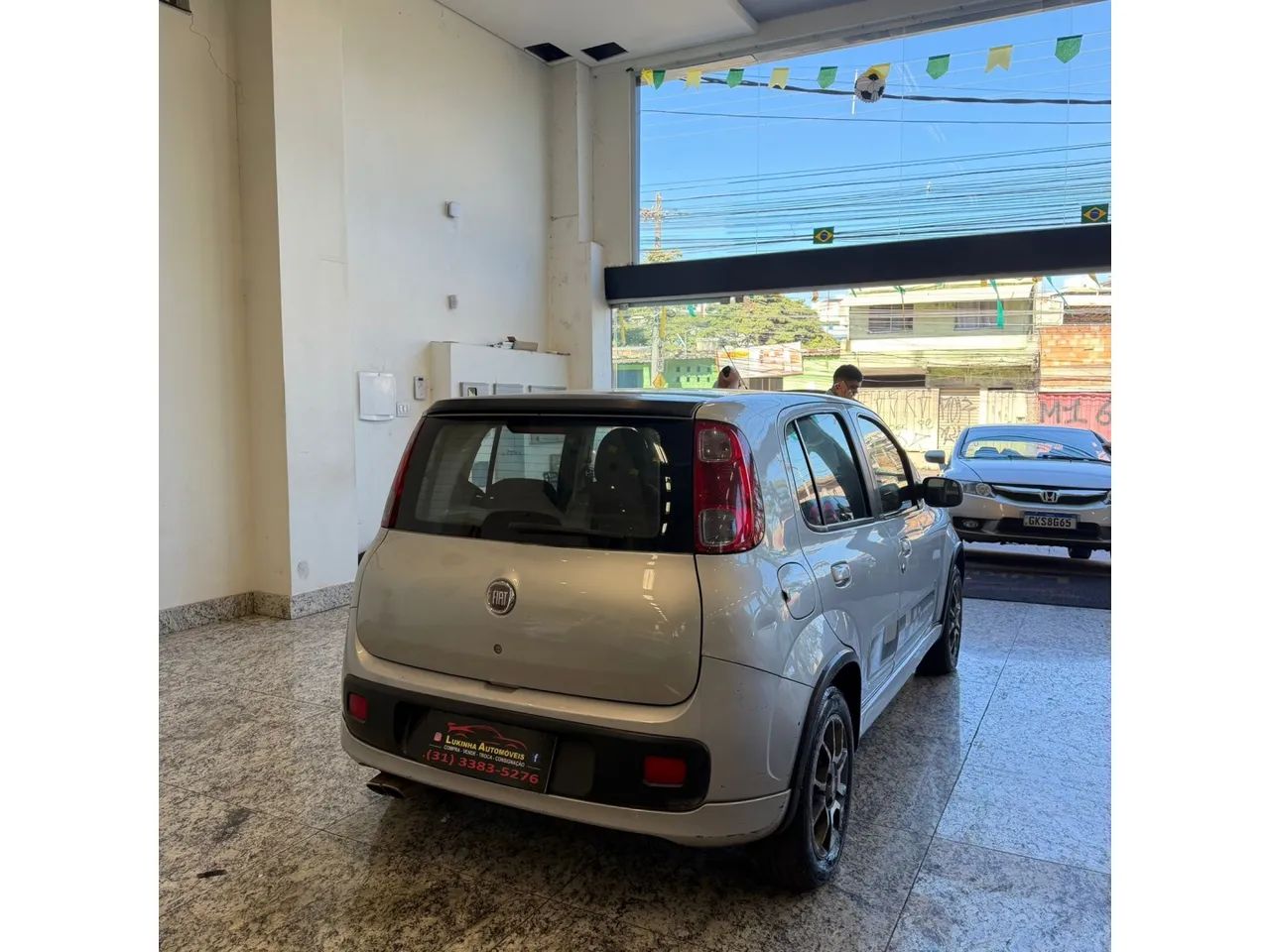 Fiat Uno Sporting 1.4 EVO Fire Flex 8V 4P 2012 - Foto 4