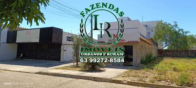 Sala Comercial com casas fundos