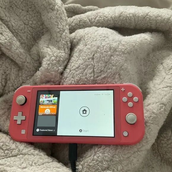 Vendo nintendo switch lite(bloqueado) + jogo