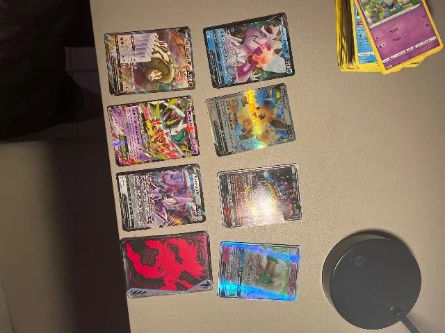 Cartas pokémon 139 cartas e 7 cartas raras - Foto 2