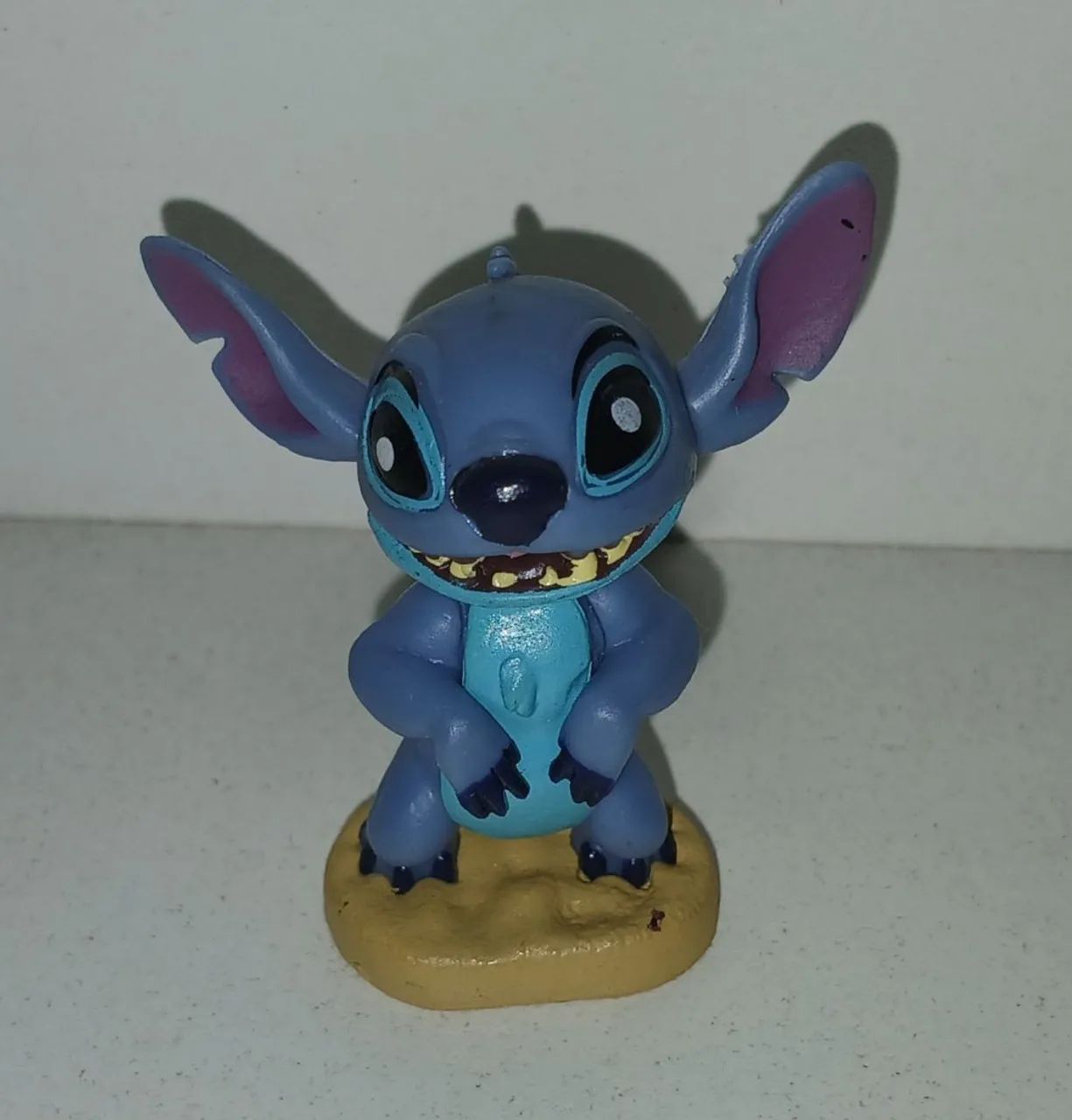 BONECO MINIATURA LILO E STITCH AREIA