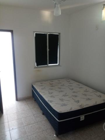 Apartamento 1 quarto e sala com varanda e quintal em condominio stella maris
