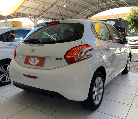 Peugeot 208 active 1.5 8v flex mec. 13/14 veículo em ótimo estado de conservação - Foto 5