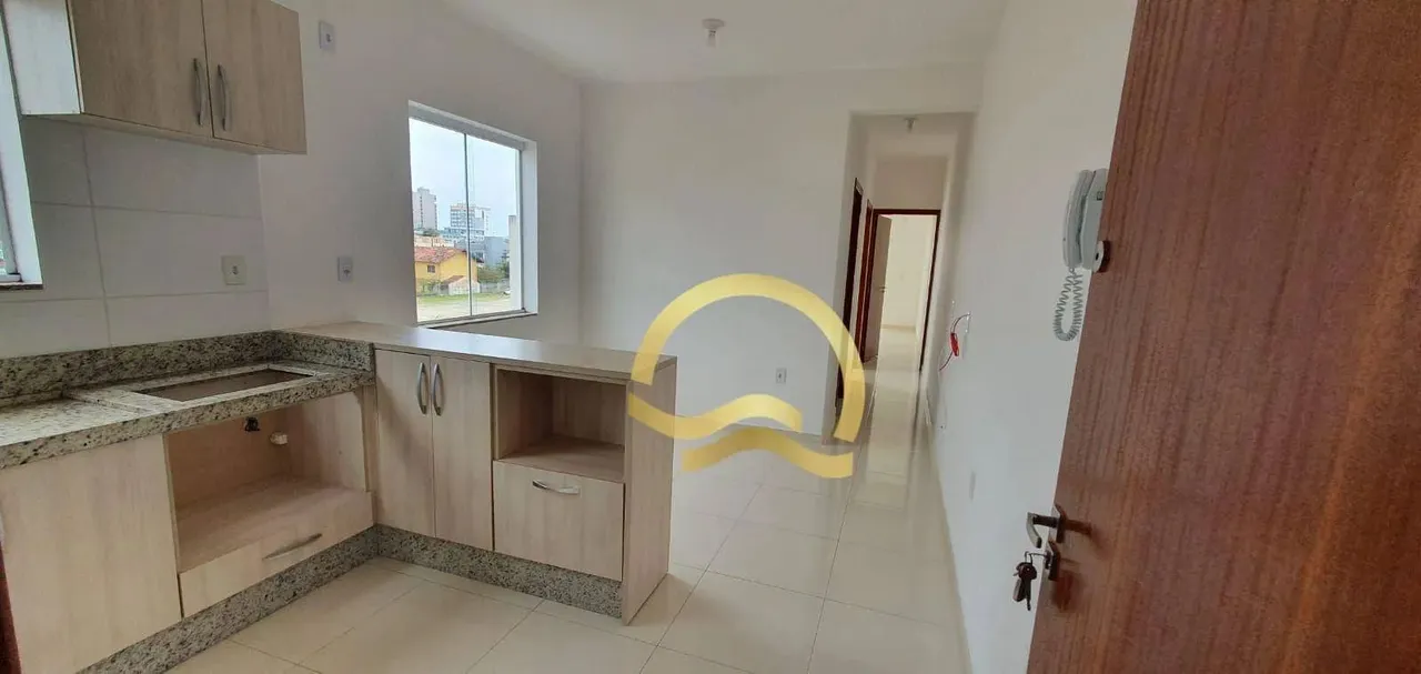 Apartamento com 2 dormitórios para alugar, 61 m² por R$ 2.925,00/ano - Centro - Balneário 