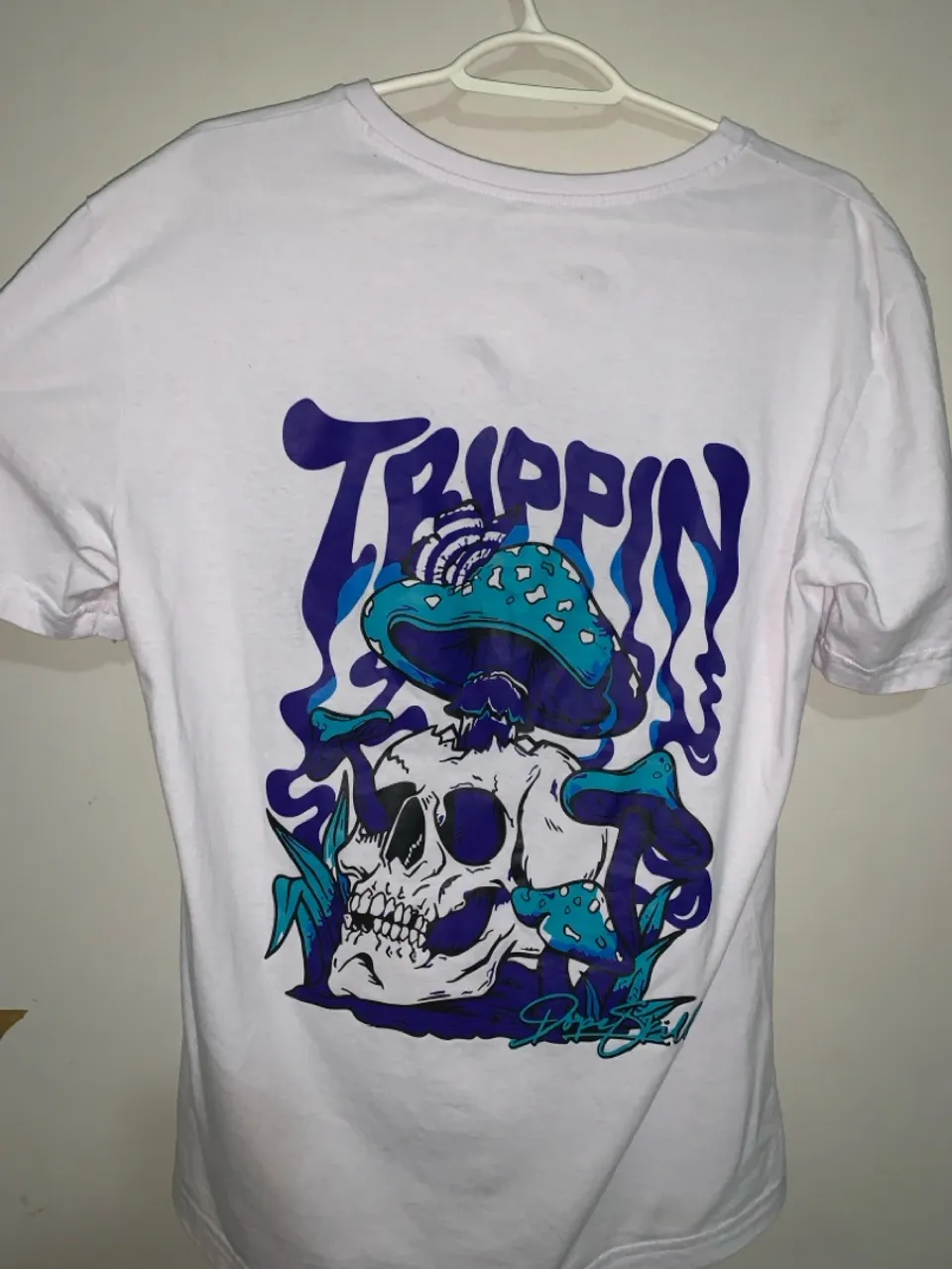 Camiseta Trippin Skull | peça streetwear