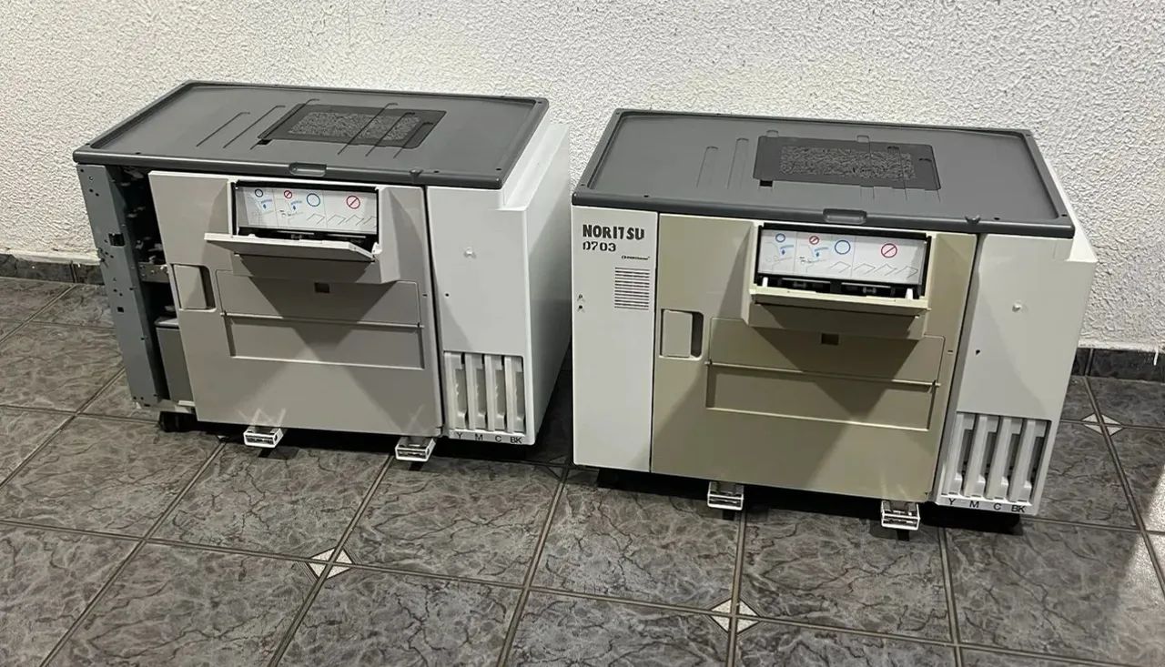 Impressora  de laboratório noritsu d703 defeito 