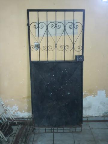 Vendo porta de ferro