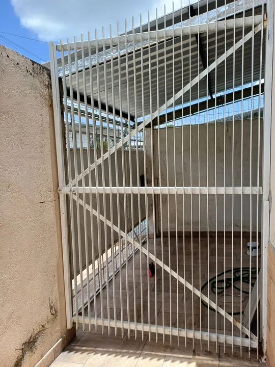 Portão de Ferro fundido, medindo AxL 2.58x1.28 se quiser adaptar transforma em portão.