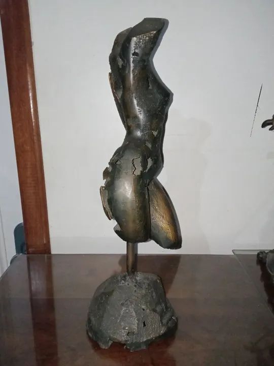 Escultura em bronze 64299512114689122