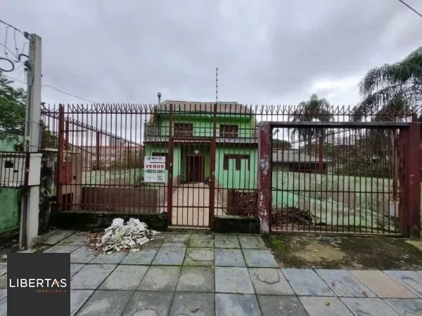 Sobrado em Porto Alegre, no bairro Glória, com 5 dormitório(s), e 5 banheiros, à