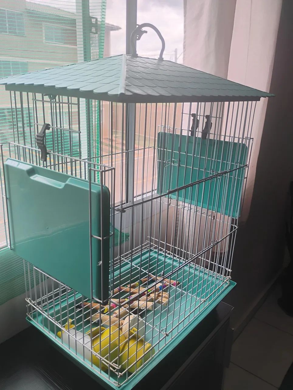 Gaiola para pássaro