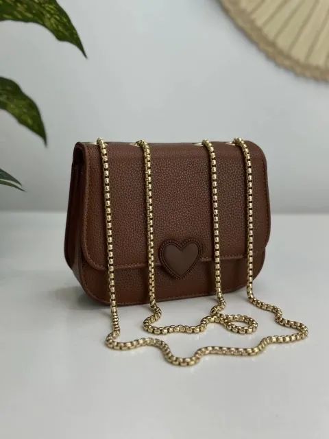 Bolsa com detalhe coração 