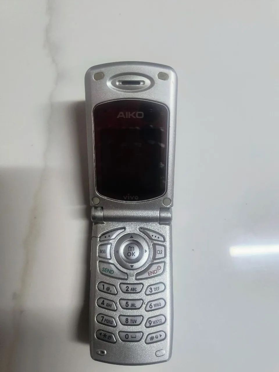 Celular Aiko com defeito 