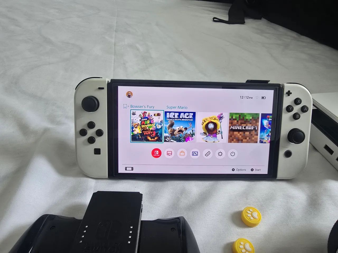 Nintendo switch oled + 8 jogos - Foto 2
