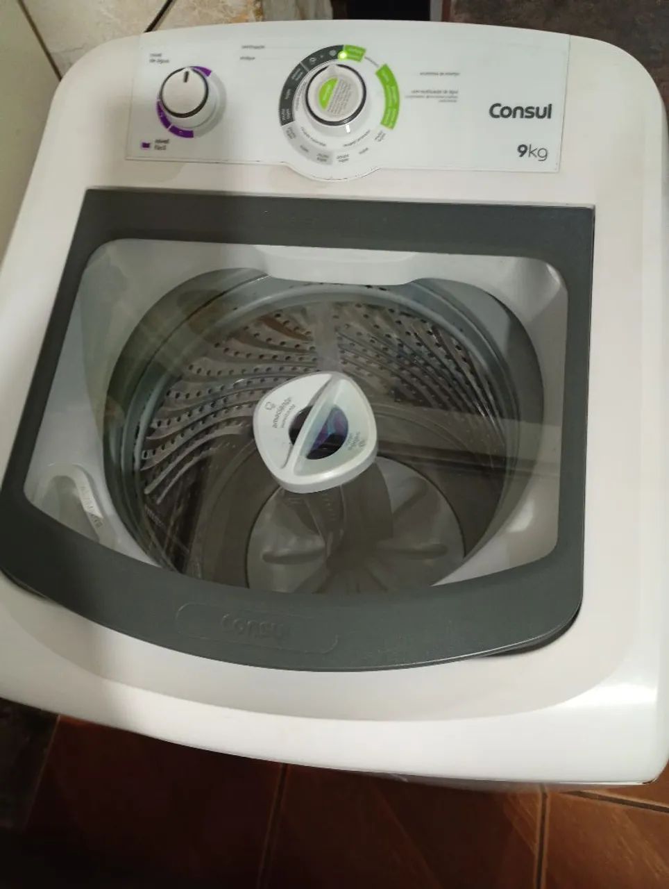 Máquina de lavar roupa funcionando perfeitamente 