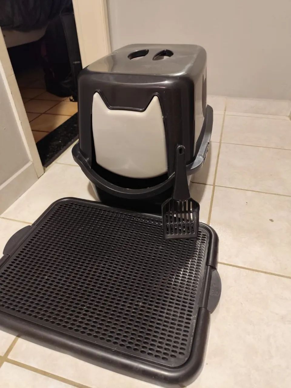 Casinha de areia para gatos 