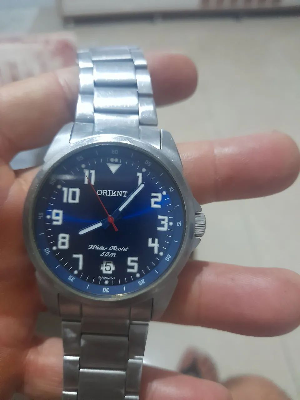 Vendo um relógio orient funcionando perfeitamente 