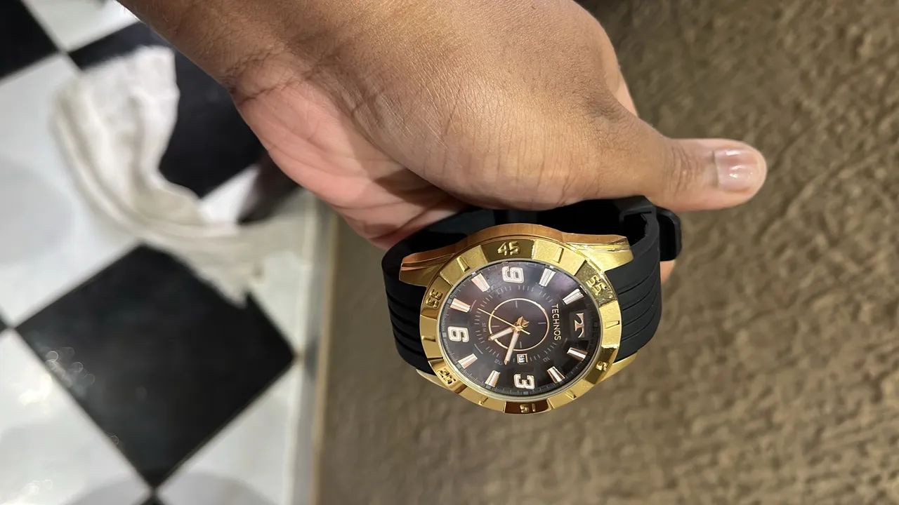 Relógio technos dourado