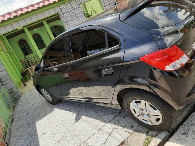 Vendo ônix 2018 já financiado - Foto 3
