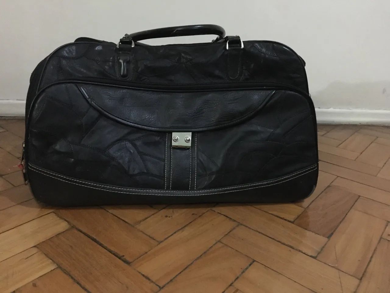 Bolsa de viagem preta em couro legitimo