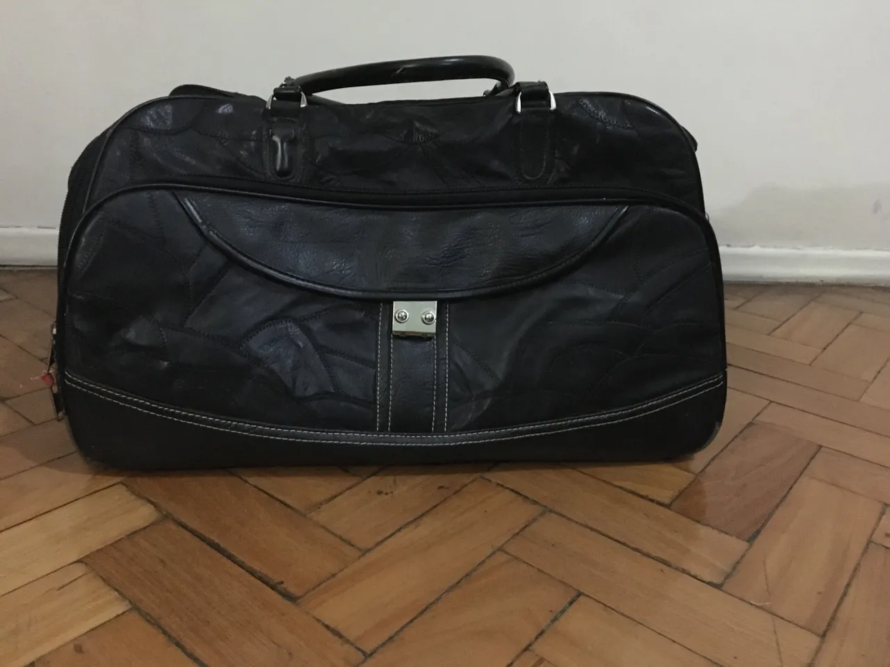Bolsa de viagem preta em couro