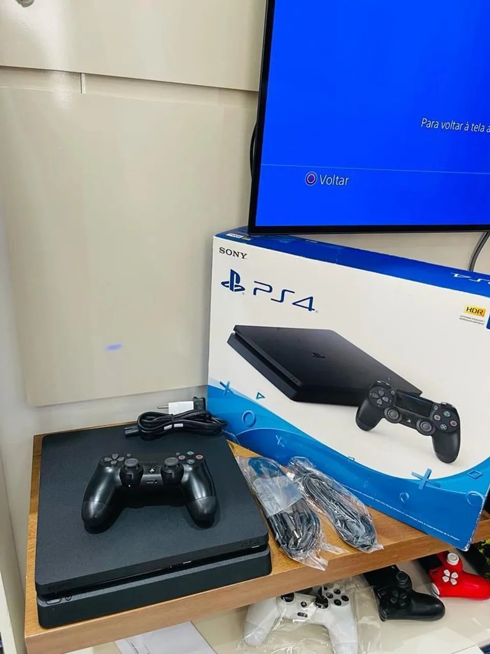 VENDO ou TROCO PlayStation 4 slim 500gb, completo com jogos, aceito cartão <br><br>