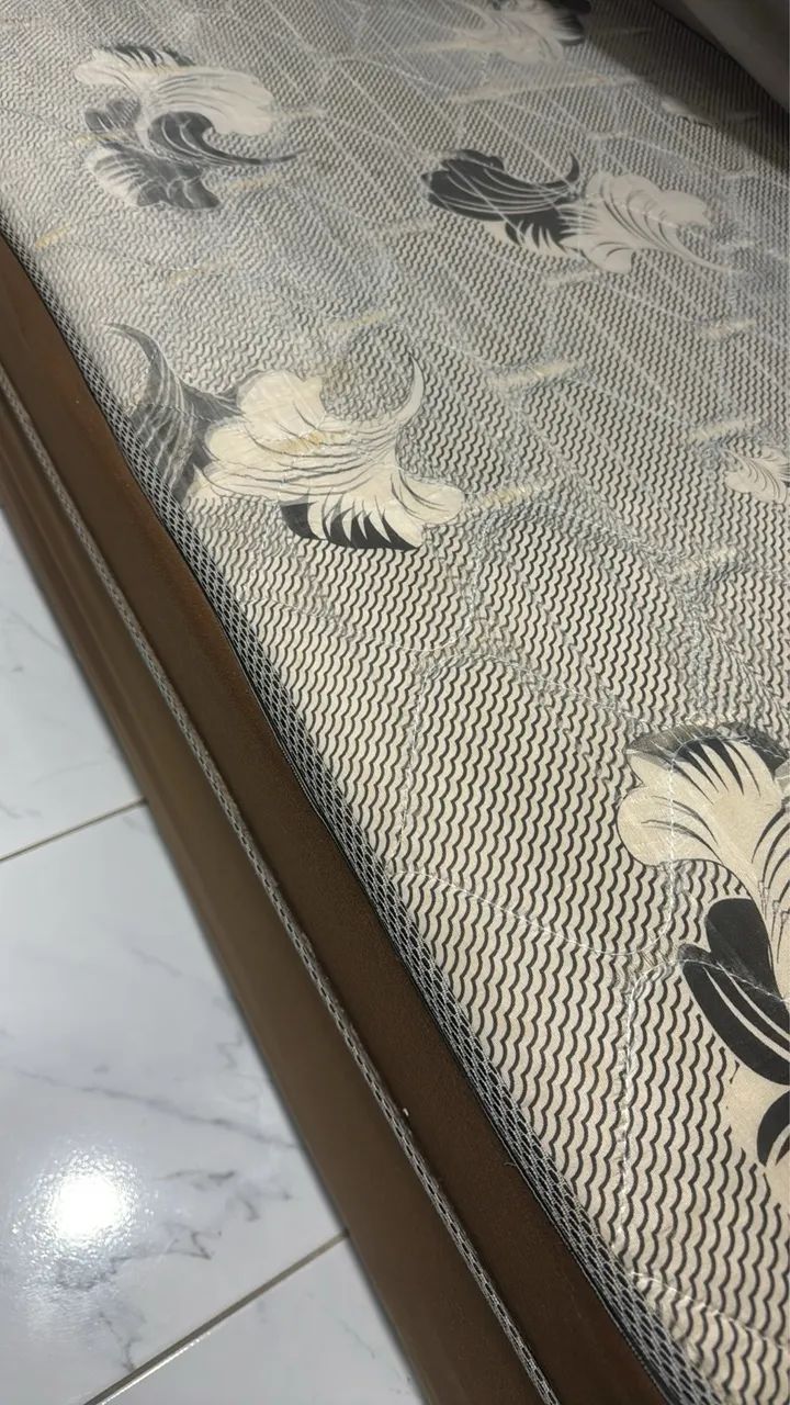 Cama Box solteiro acoplada.