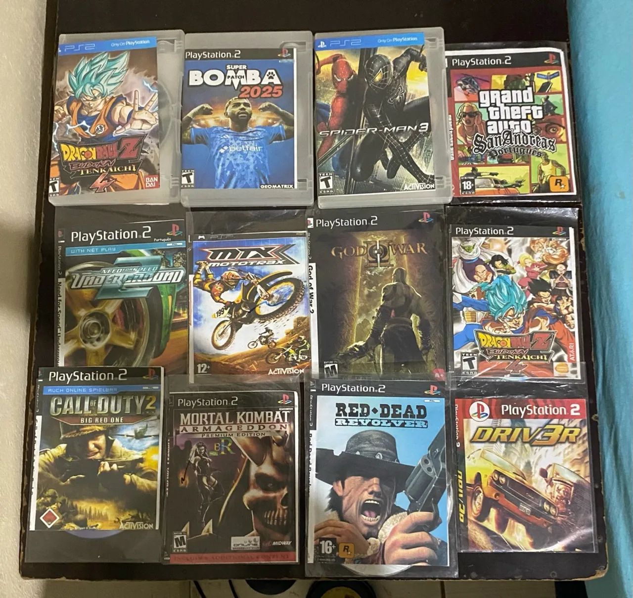 Ps2, com duas manetes e 12 jogos - Foto 2