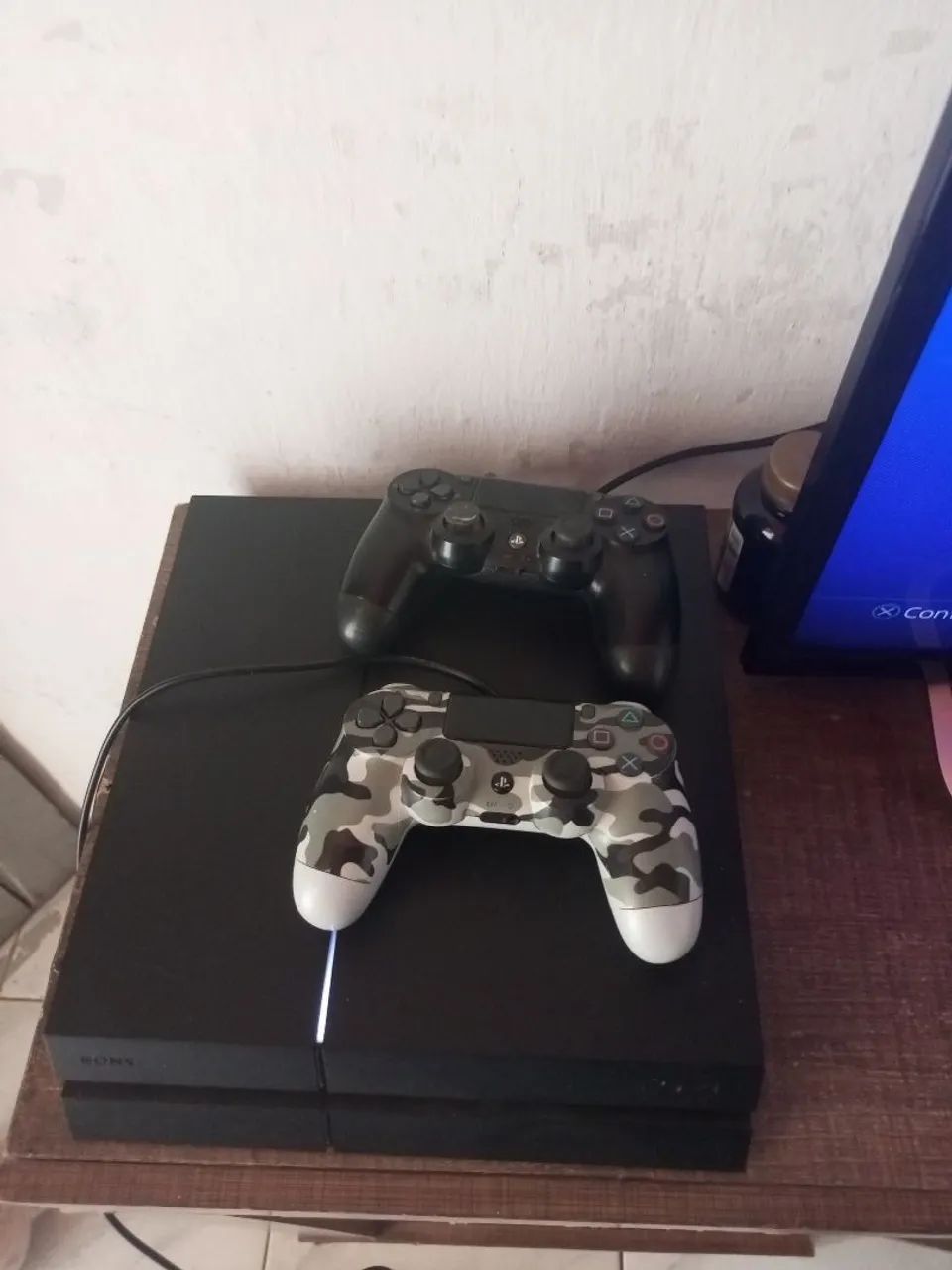 PS4 com 2 controle original +10 jogos 