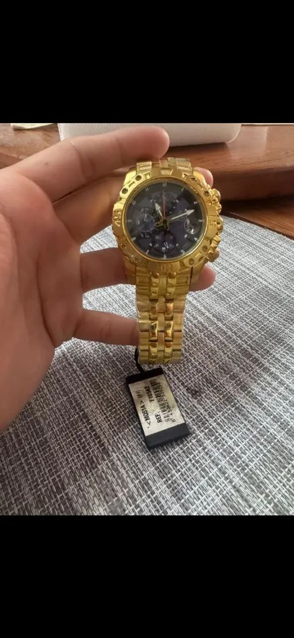 Relogio Festina dourado 