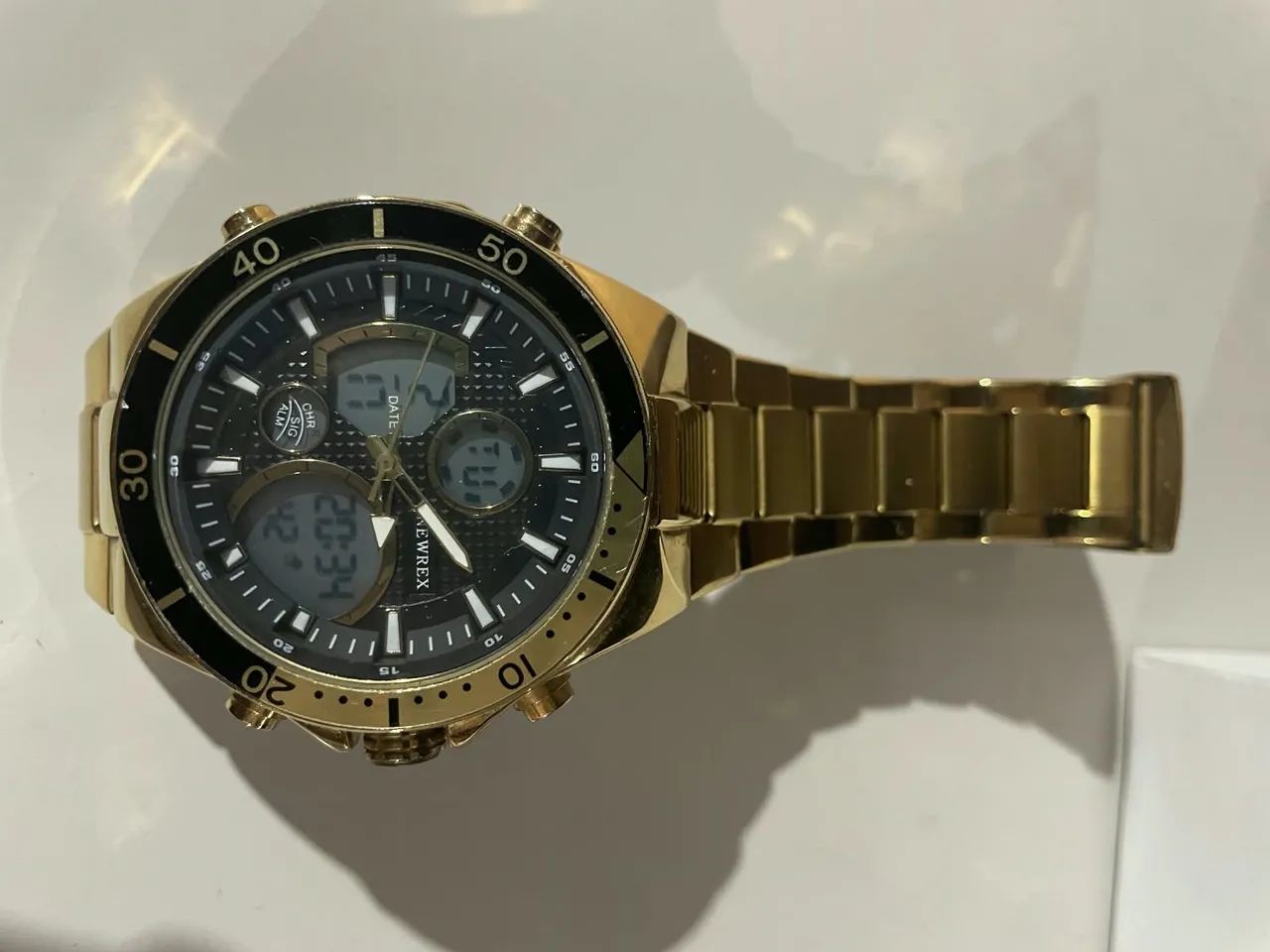 Relógio dourado newrex  - Foto 3