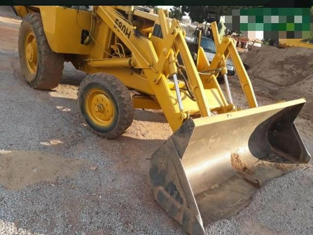 Retroescavadeira Case 580
