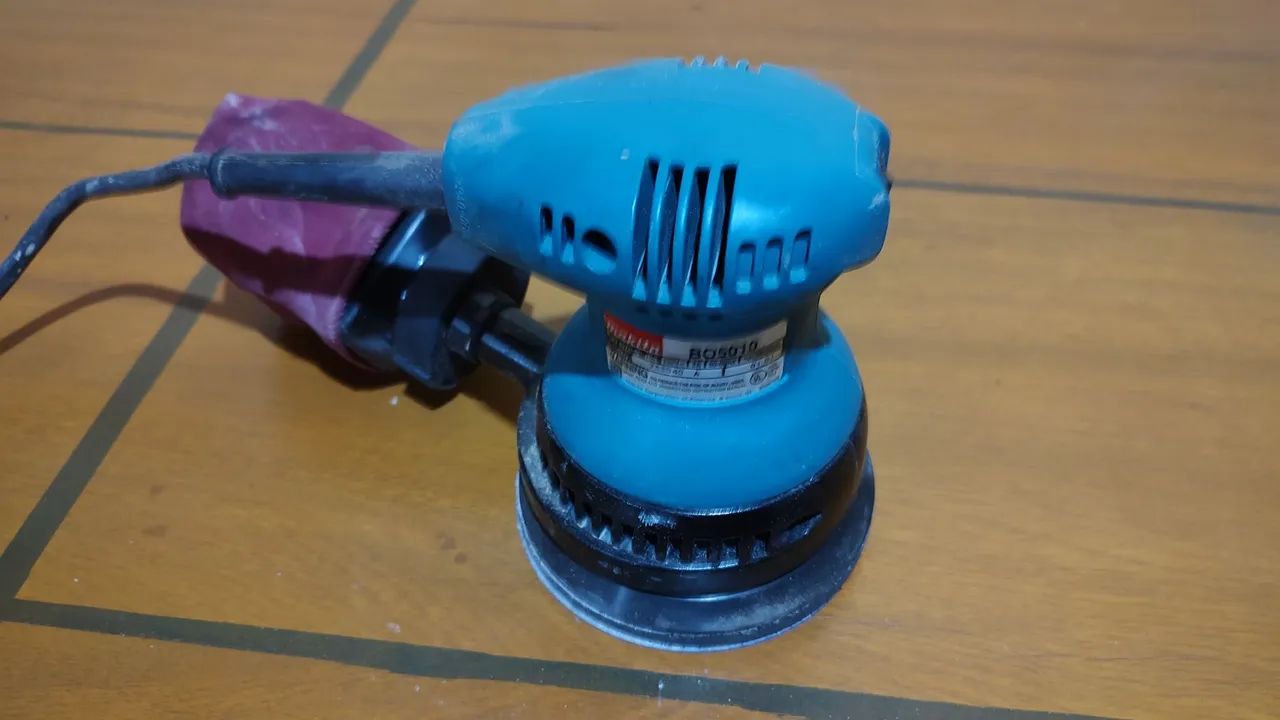 Lixadeira roto orbital Makita BO5010. 127v 240w - Foto 5