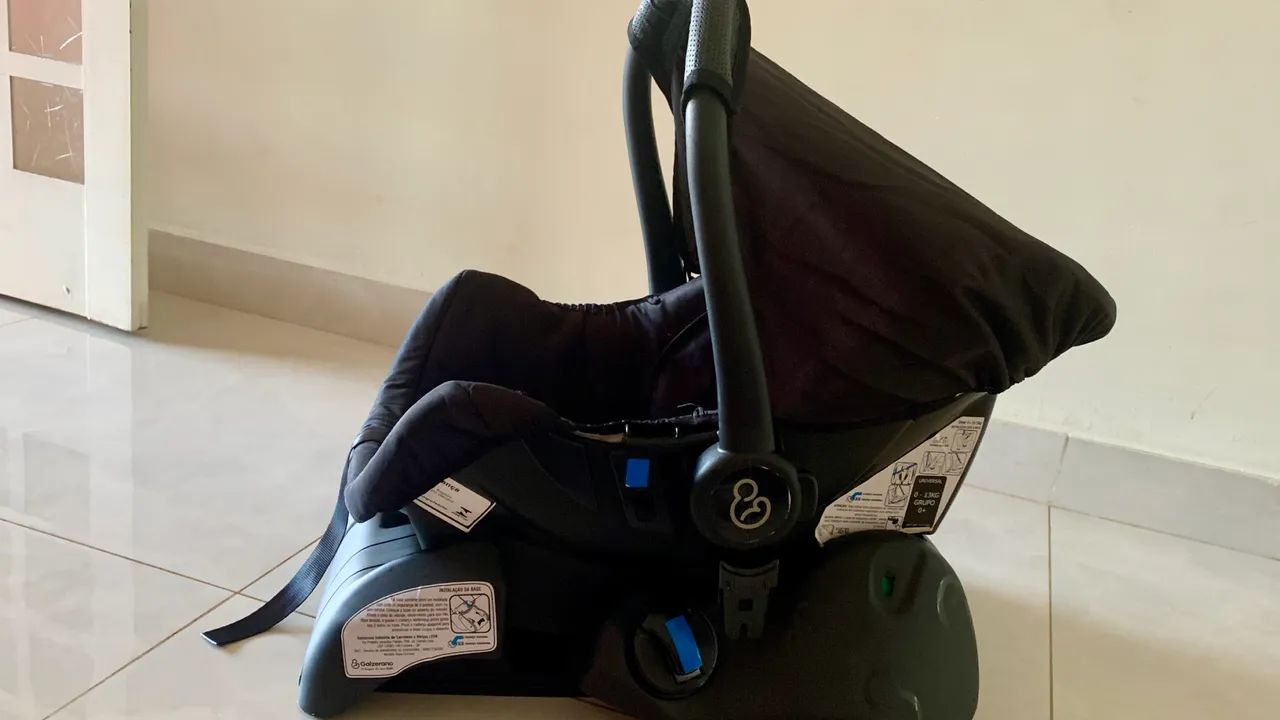 Bebê conforto com base para carro