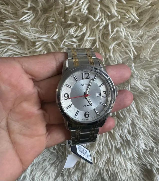 Orient prata com dourado- original, prova dágua e com garantia da autorizada 
