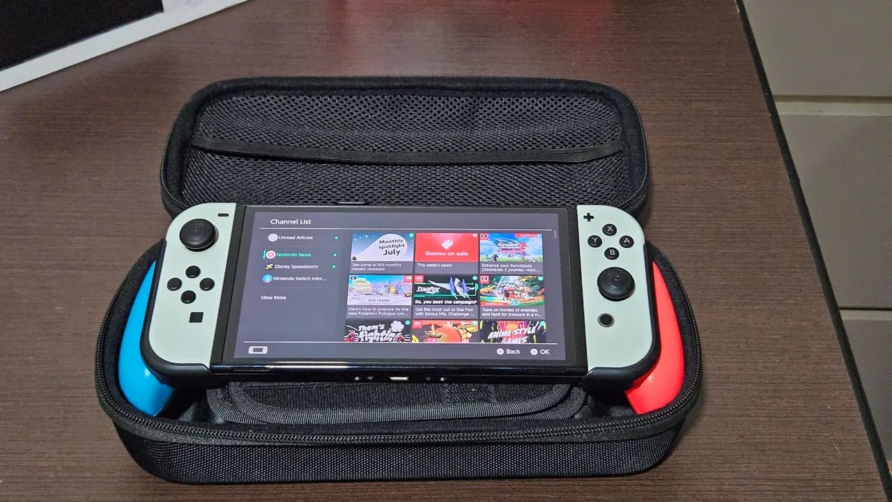 Nintendo Switch OLED + case e grip  - Foto 4