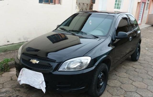 Vendo Celta 2012 ou troco por moto Cg