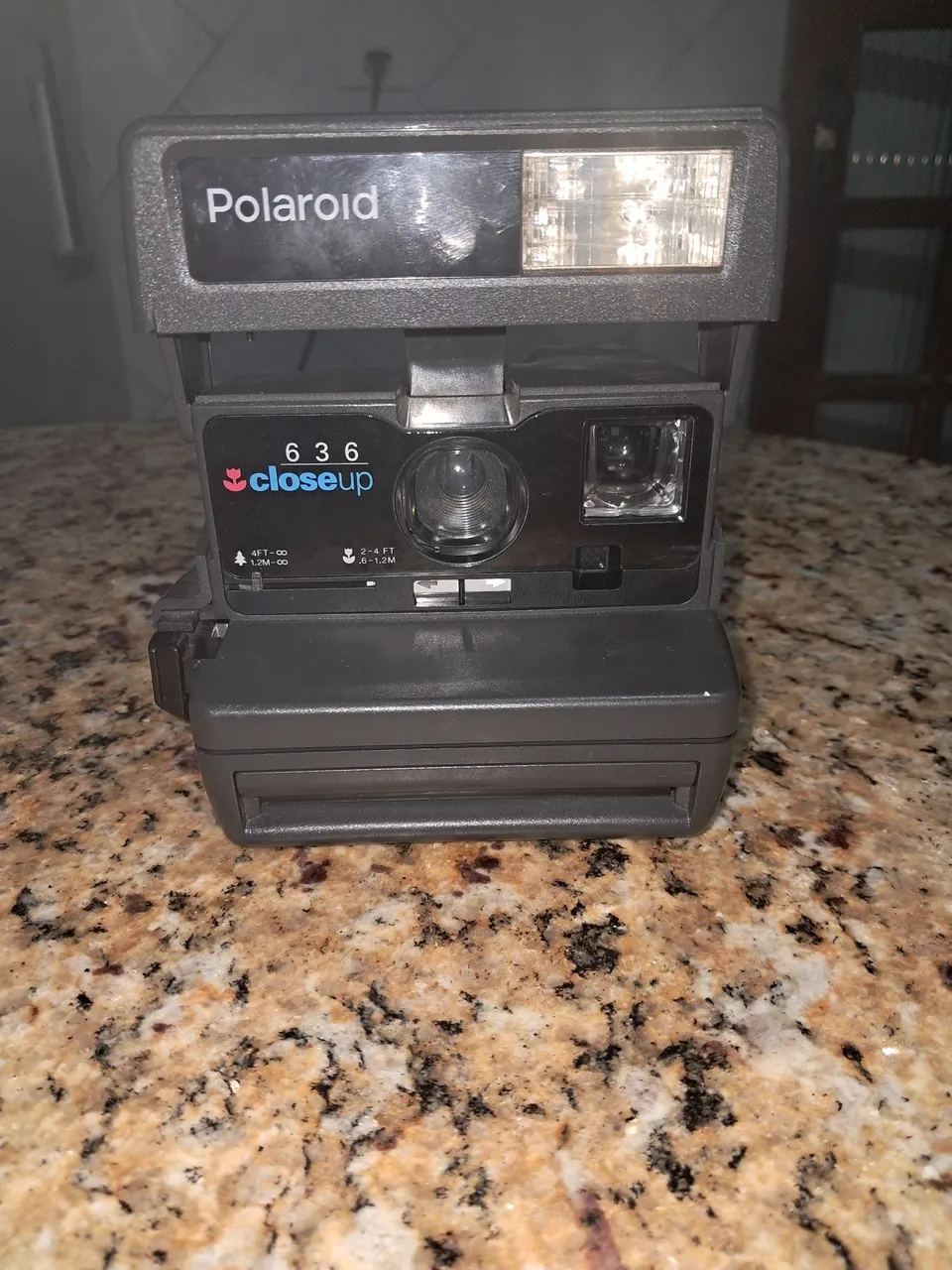Câmera  Polaroid nunca usada