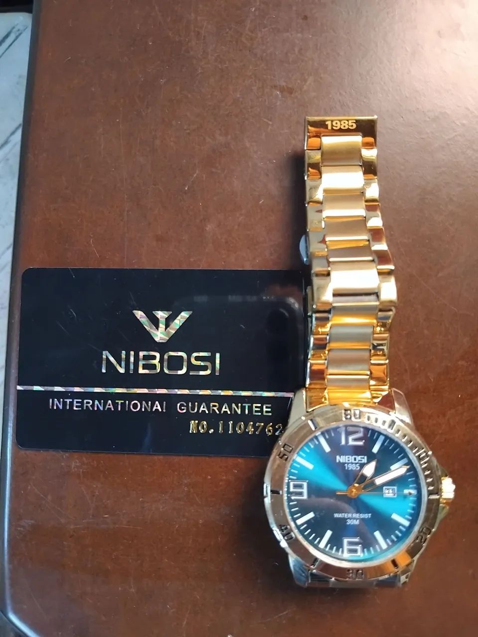 Relogio nibosi dourado  - Foto 2