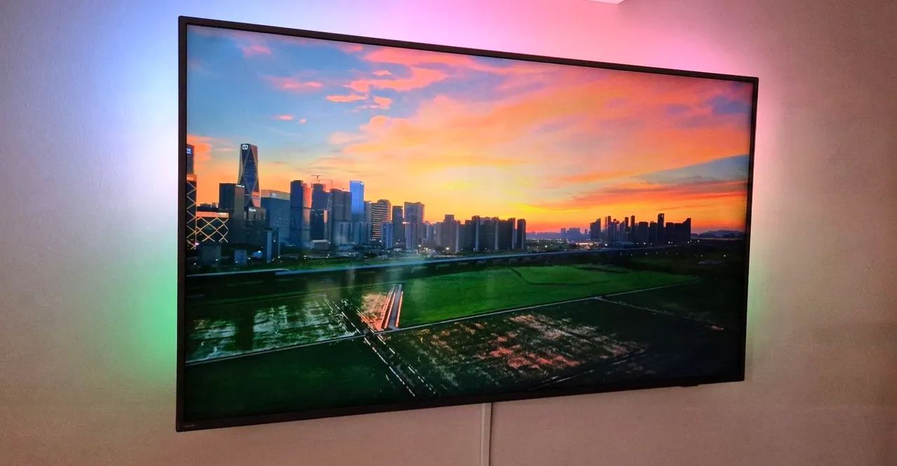 Smart TV Philips 65" 4K UHD Ambilight (Iluminação na parede) HDR10+  - Foto 2