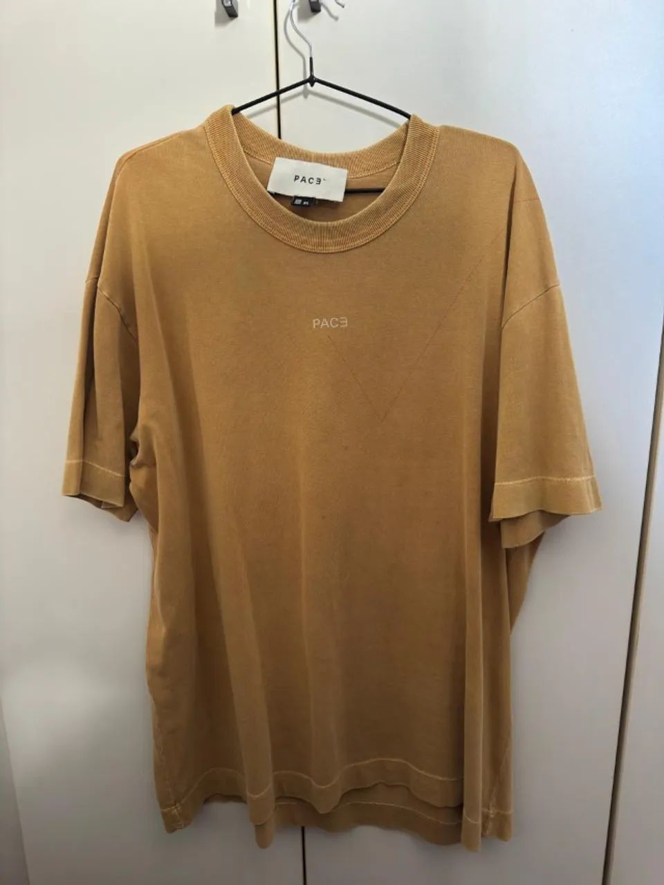 Camiseta pace bege